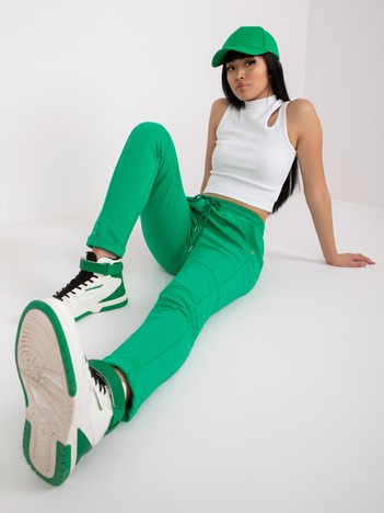 Grüne Baumwoll-Sweatpants mit hohem Bund.
