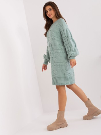 Großhandel Minze Strickkleid mit Zöpfen.