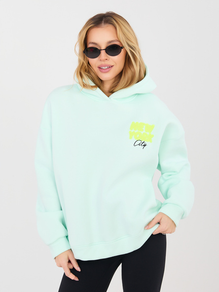 Minzfarbene Damen-Overzize-Hoodie mit Kapuze.