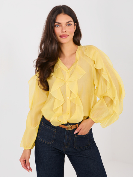 Gelbe halbtransparente Bluse mit V-Ausschnitt.