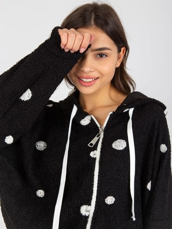 Großhandel Schwarze Plüschjacke mit Kapuze.
