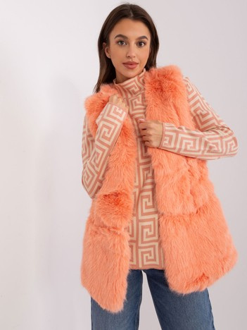 Hurt peach fur vest with lining.