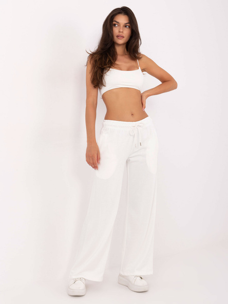 Ecru sweatpants with wide legs.
