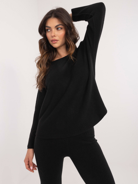 Black sweater set with pants.
