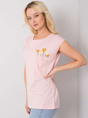 Sarah's light pink blouse