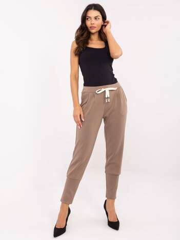 Hurt brown sweatpants with long cuffs.