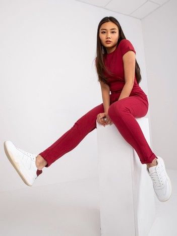 Burgundy pants Approachable.