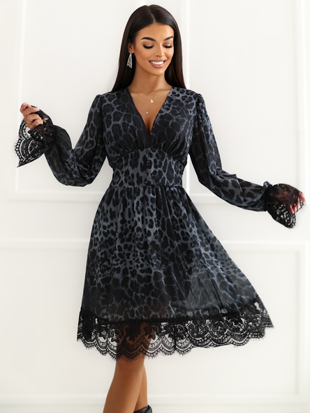 Black flared dress with leopard print.
