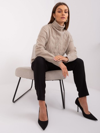 Hurt dark beige women's sweater with ribbed cuffs.