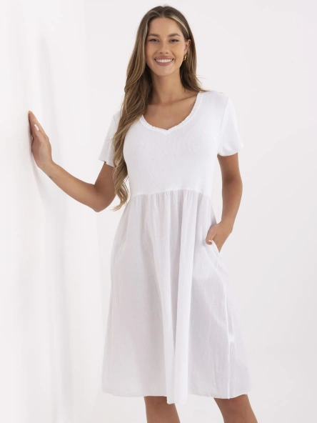 White summer dress with a V-neck.