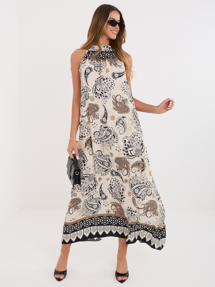 Black trapeze dress with patterns.