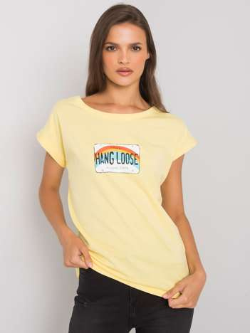 Light yellow t-shirt with Aloha print.