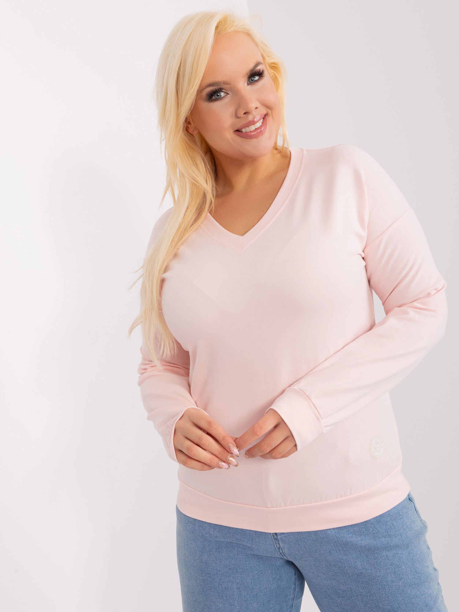 Hurtownia Jasnoróżowa bluzka plus size z bawełny