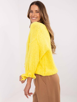 Hurt Żółty damski sweter oversize w jednolitym kolorze