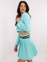 Hurt Miętowa garniturowa spódnica z plisowaniem 