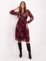 Burgundy pleated dress with a belt.