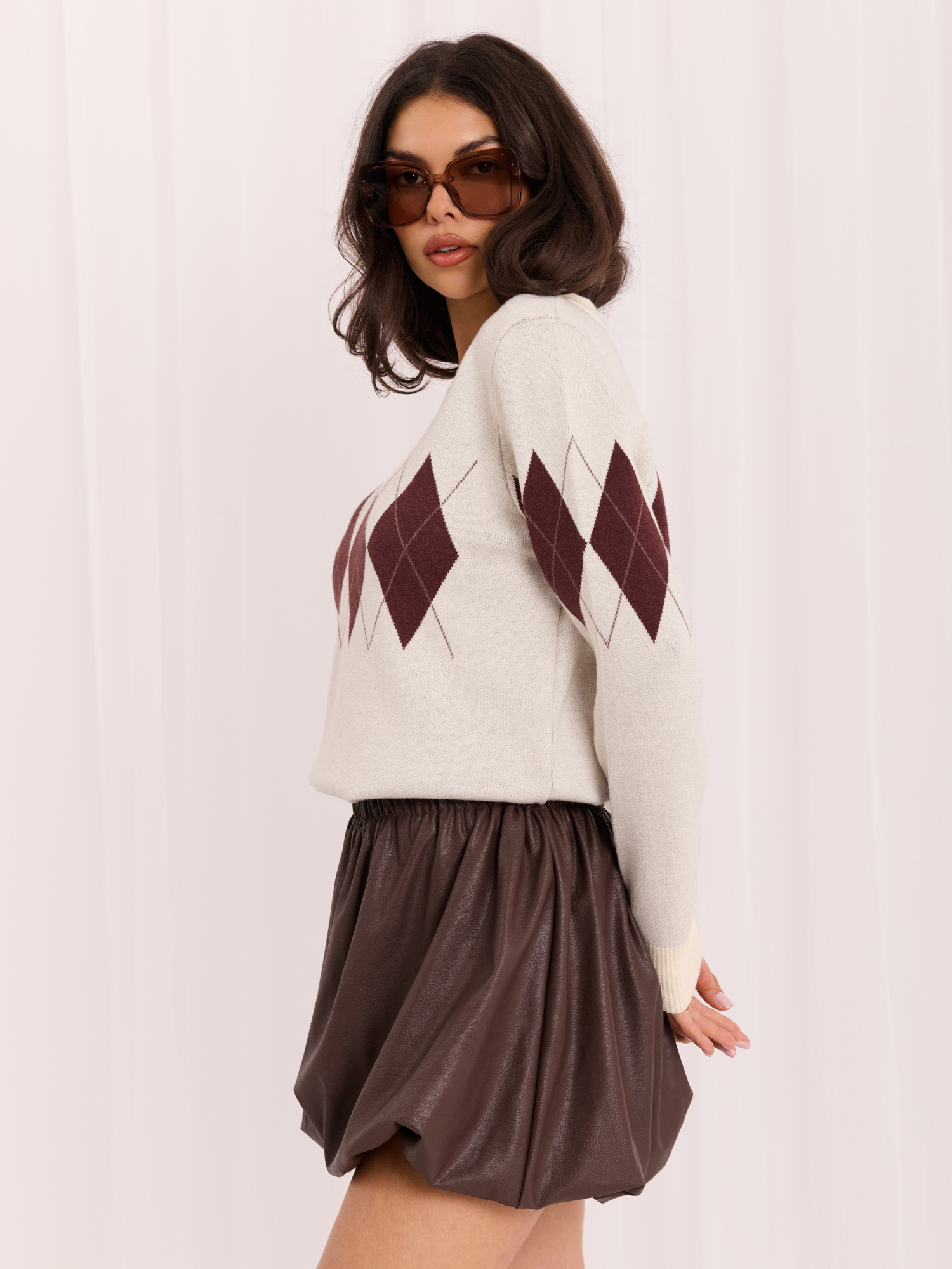 Light gray women's oversized diamond-patterned sweater.
