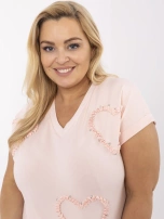 Light pink plus size blouse with appliqués.