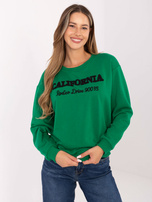 Hurtownia Ciemnozielona luźna bluza bez kaptura z napisami  