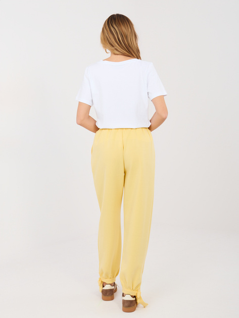 Jasnożółte dresowe spodnie z kieszeniami