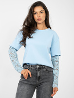 Jasnoniebieska bluzka oversize z koronką
