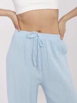 Jasnoniebieskie muślinowe spodnie z wiązaniem OCH BELLA 