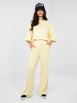 Pastelowe żółte spodnie wide leg z wysokim stanem RUE PARIS