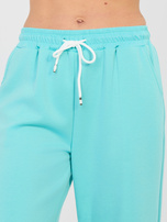 Miętowy dresowy komplet z prostymi spodniami RUE PARIS 