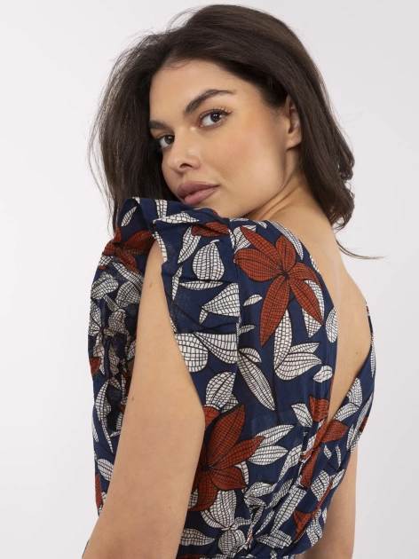 Granatowy kombinezon z falbankami przy rękawach