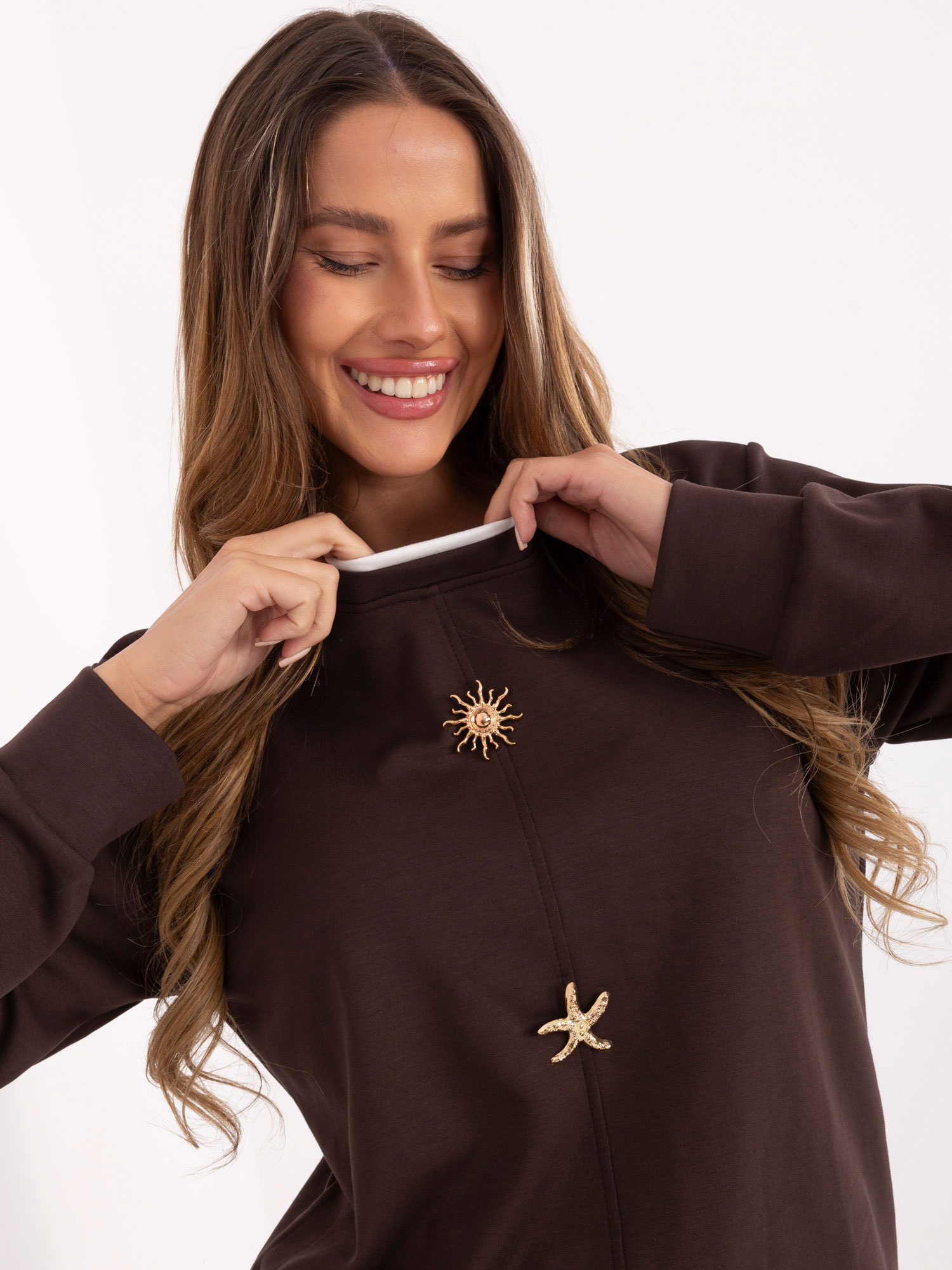 Dark brown women's blouse with a round neckline.