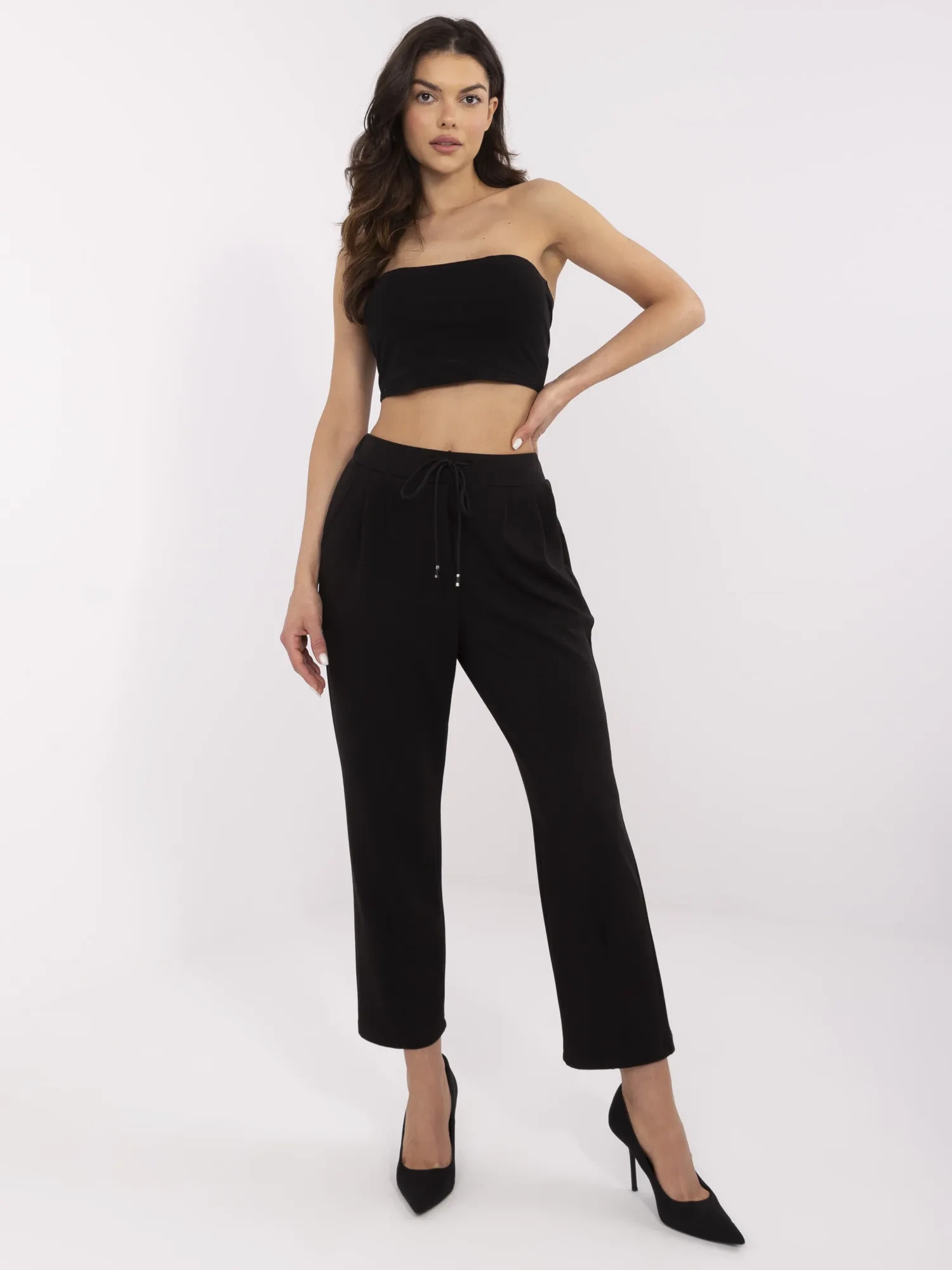 Black pants made of pleasant-to-touch material.
