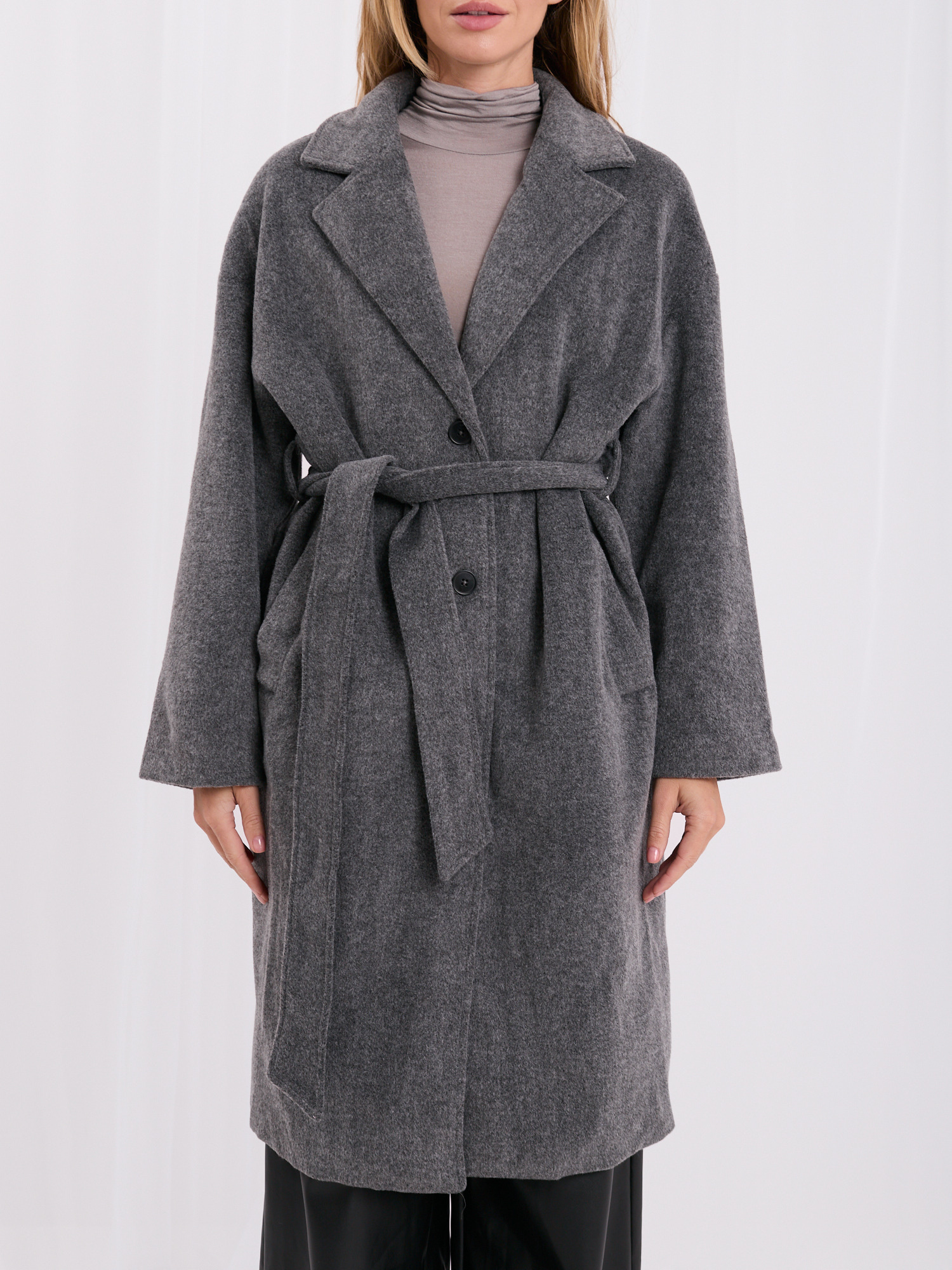 Dark gray oversized transitional coat with a belt.