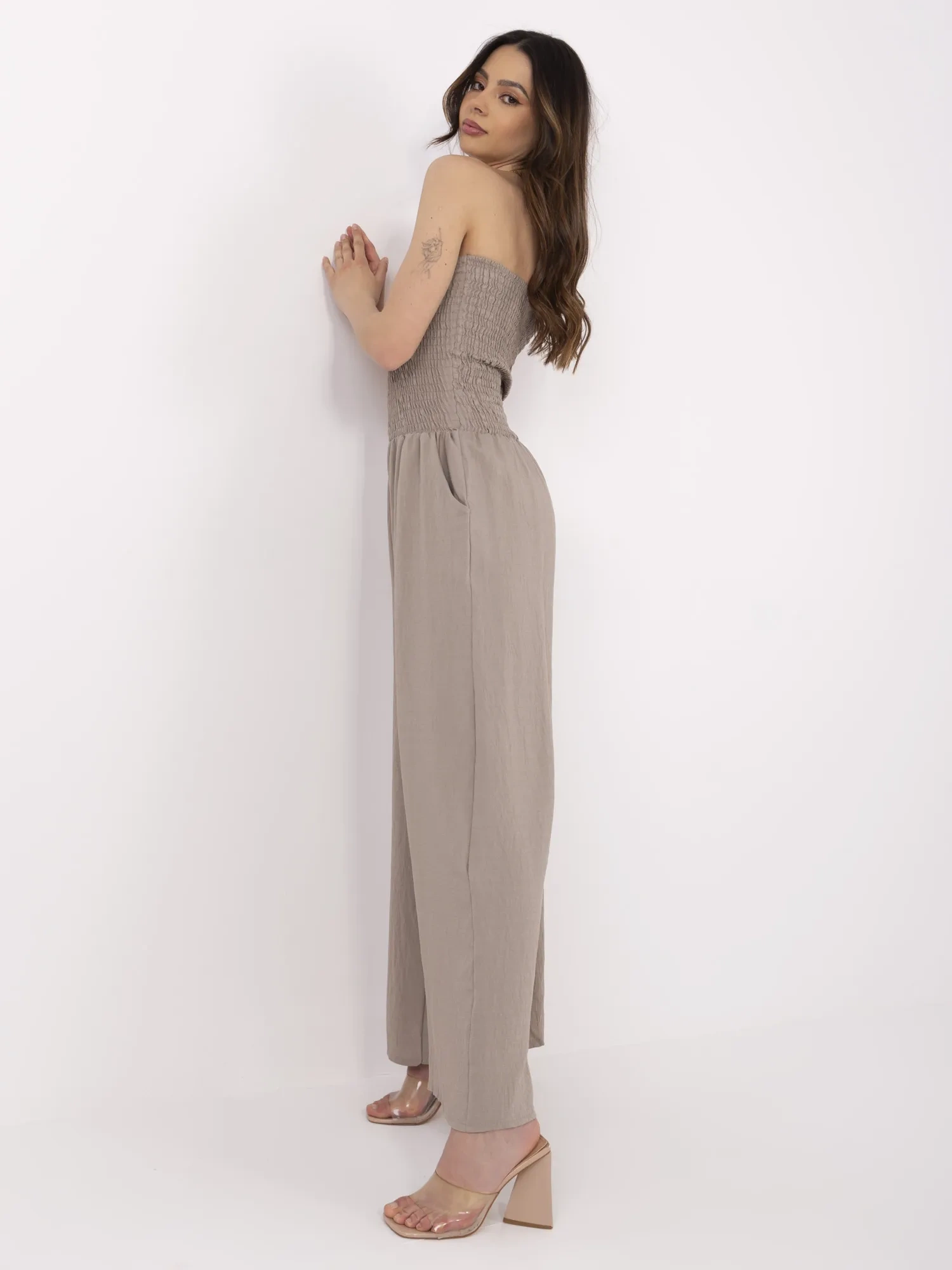 Kombinezon ciemny bezowy