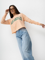 Pfirsichfarbener Hoodie mit kontrastierendem Schriftzug SUBLEVEL.