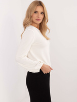 Hurtownia Ecru luźna bluzka longsleeve z naszywką