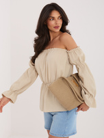 Beige muslin off-shoulder blouse made of cotton.