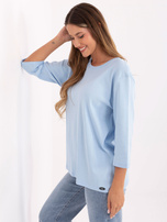 Jasnoniebieska damska bluzka w jednolitym kolorze 