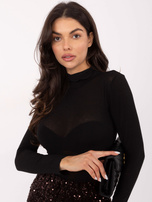 Black fitted turtleneck top.