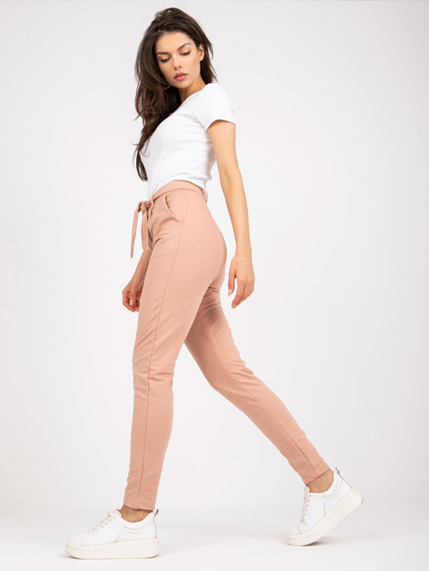 Beżowe spodnie z materiału z kieszeniami RUE PARIS