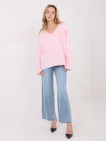 Jasnoróżowa bluzka oversize z długim rękawem