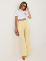Jasnożółte damskie spodnie palazzo z kieszeniami RUE PARIS