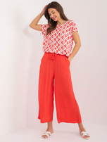 Hurt Koralowe zwiewne spodnie z materiału SUBLEVEL