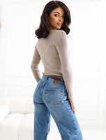 Beige elegant sweater with a shiny thread.