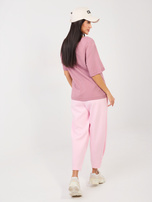 Jasnoróżowe damskie spodnie ze zwężaną nogawką