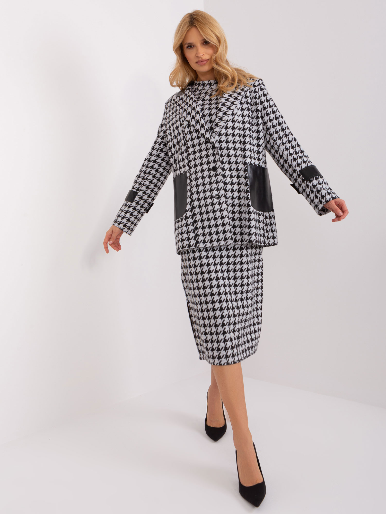 Hurt black-and-white women's jacket in houndstooth.