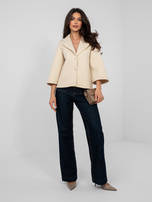 Jasnobeżowy jednorzędowy płaszcz z kołnierzem