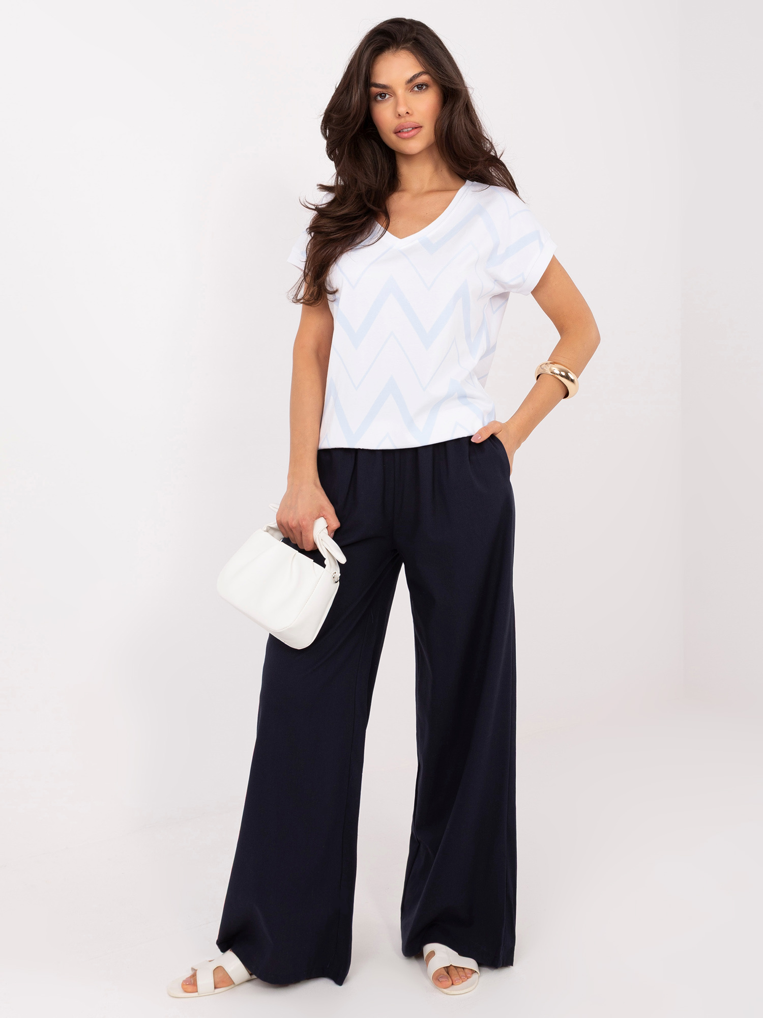 Jasnoniebieska damska bluzka w geometryczny wzór