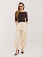 Jasnobeżowe spodnie parachute z kieszeniami RUE PARIS 