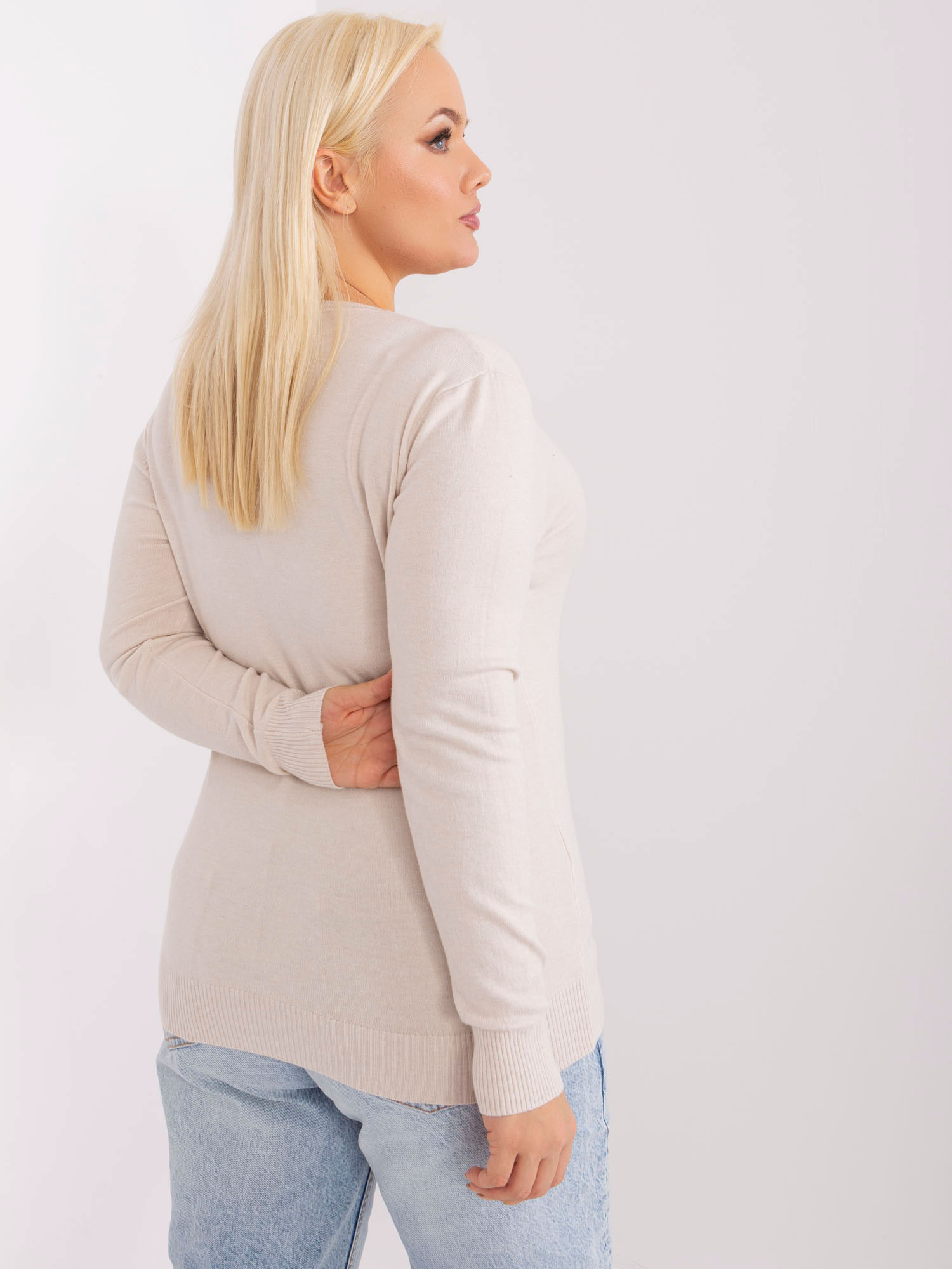 Hurt light beige fitted plus size sweater with V-neck.