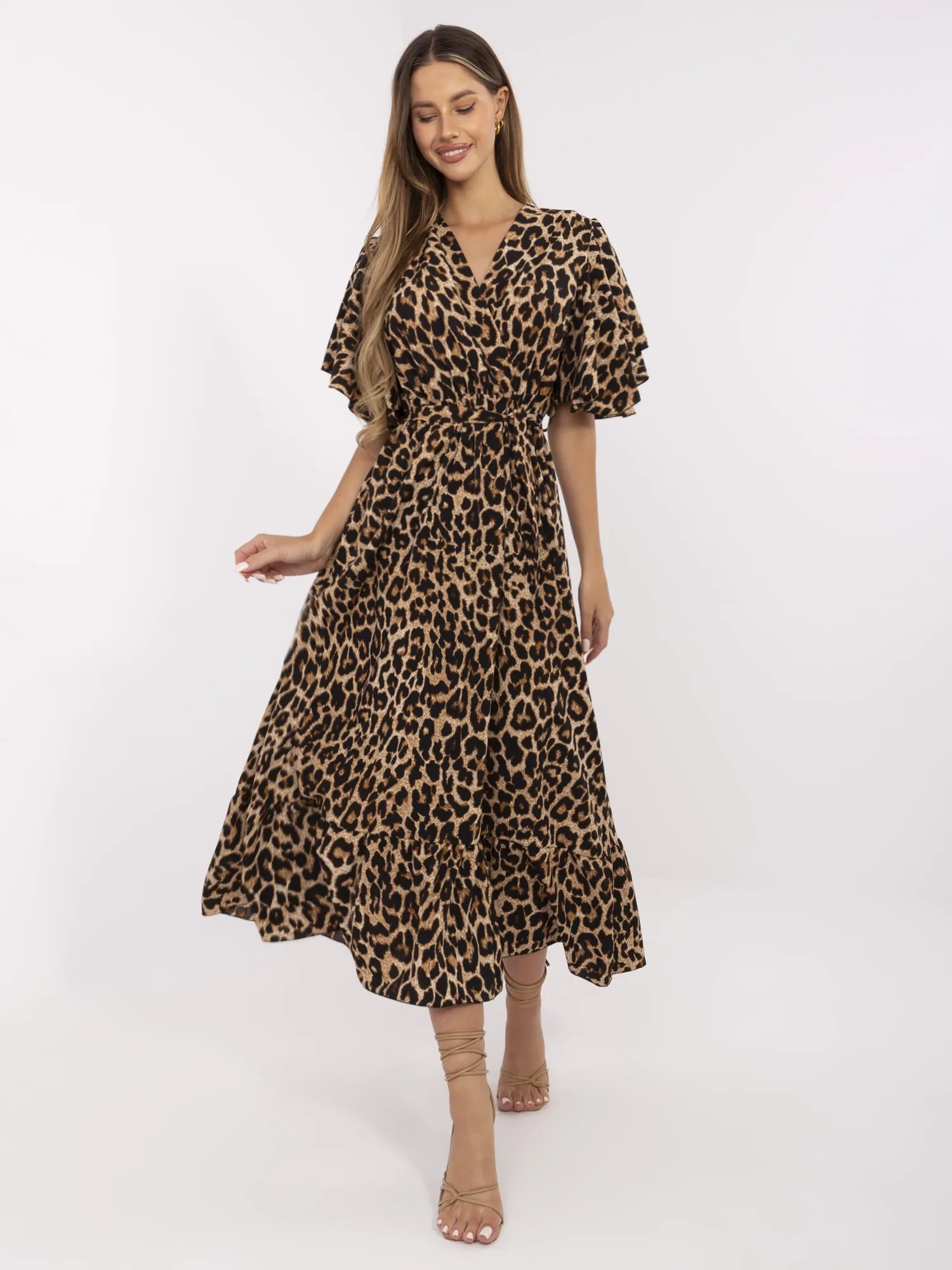Camel and black flared dress with a belt.